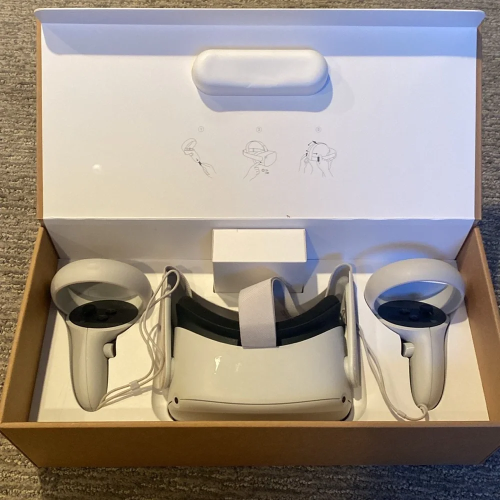 Oculus QUEST 2 64gb -great condition -charging cable and glasses spacer missing